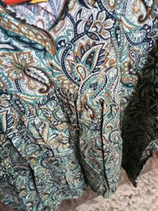 Paisley Print Sleeveless turtoise short kurti