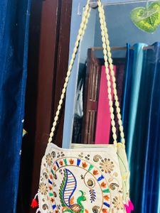 Peacock Charm Embroidered Sling