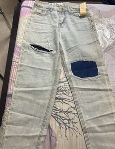Ripped Jeans - Light Wash Denim