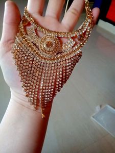 Golden Stone Necklace with ear rings and mangtika