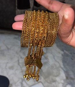 Thin Girl Golden Petal Jhumer Bangles