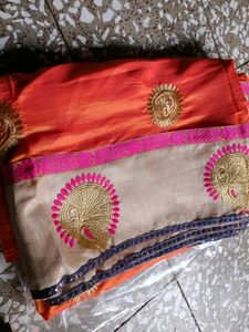 Elegant Orange Embroidered Saree
