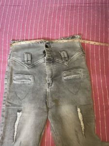Distressed High-Waisted Jeans