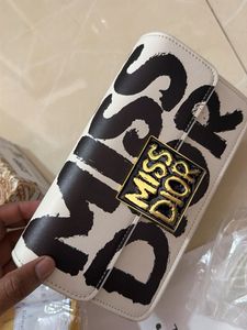 Miss Dior Clutch sling bag