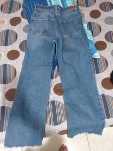 Ripped Blue Denim With Strechable Material .