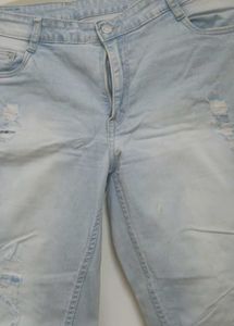 Ice Blue Colour Ripped Jeans