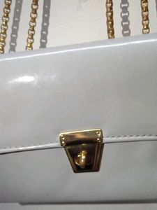Chic Grey Crossbody Bag with Gold Chain