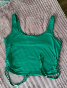 GREEN CROP TOP WITH SIDE STRINGS
