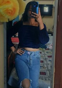 Top and Ripped Knee Jeans