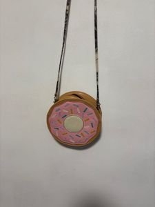 Donut shaped cross body bag