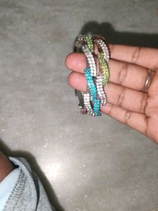 2 Sets Of Two Shiny Bangles