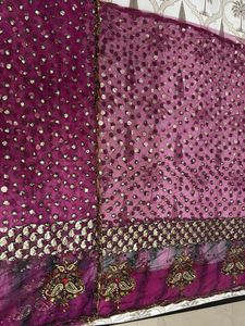 Heavy Purple Stone And Sequin Work Net Saree
