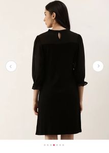 Chic Black Dress with Sheer Sleeves