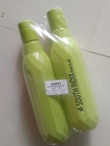 2 Green Plastic Bottles
