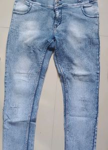 Scratched Denim Blue Jeans