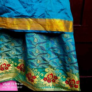 Teal Silk Blouse And Long Skirt( Pattupavada)