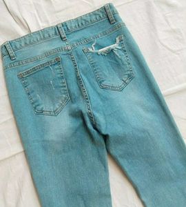 Ripped Fringe Hem Flare Jeans