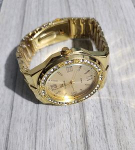 GOLD QUARTZ WITH SILVER DIAMOND WRIST WATCH
