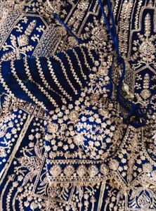 Elegant Blue Embellished Lehenga Choli with Dupatt