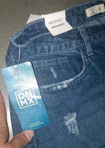 Distressed Blue Denim Jeans