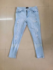 Ripped Light Wash Blue Jeans