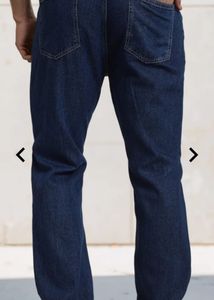 street full length heavy distressed straight jeans