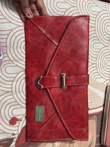 Women red clutch