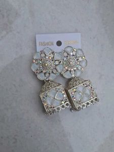 white jhumka earrings