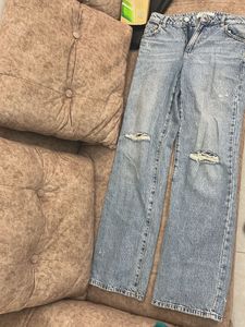 Ripped Knee Denim Jeans