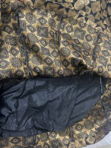 Gold And Black Lehnga Choli