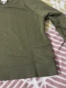 olive green sweatshirt + free gift