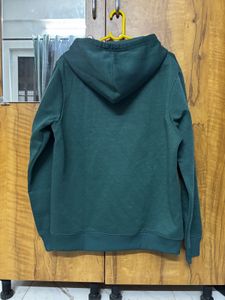 Roadster Solid Green Men Hooded Sweatshirt.