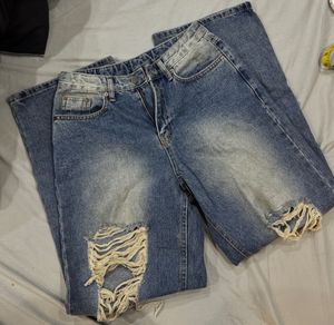 Blue ripped baggy jeans