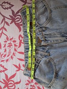 Distressed High-Waisted Denim Jeans