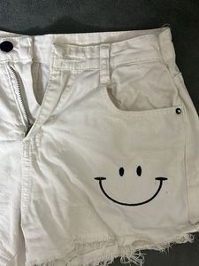 Distressed White Denim Shorts