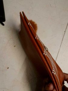 Brown Clutch with Pom-Pom