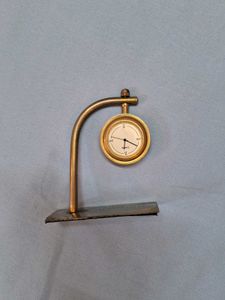 DECORATIVE PIECE WITH CLOCK