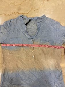 Branded buttoned top