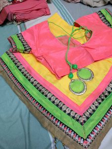 Bright Yellow Saree With Pink Blouse