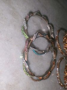 2 Sets Of Two Shiny Bangles