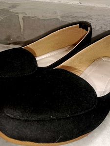 Black velvet slip-on loafers