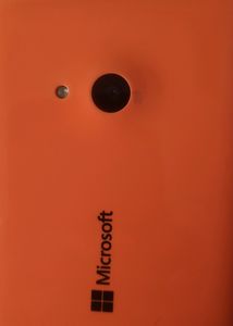 Microsoft Lumia 535, along with the charger
