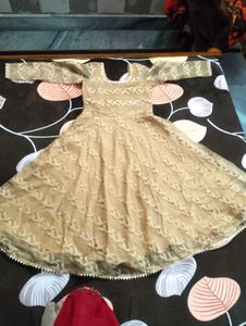 It&#39;s Beige color Gown.  I