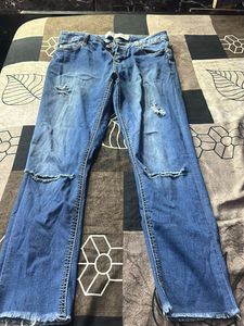 Distressed Denim Jeans