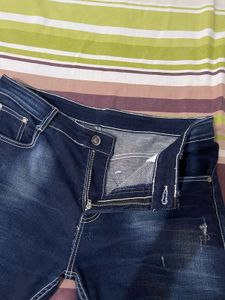 Distressed Denim Jeans