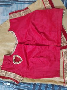 pretty red golden saree.