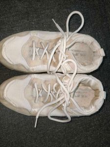 Vintage-Style Off-White Sneakers