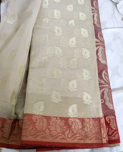 Elegant Beige Saree with Floral Border