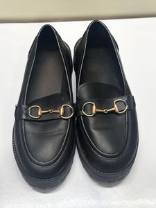 Black Loafers with Gold Detail