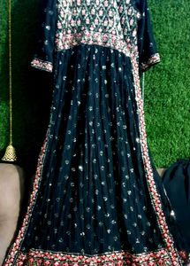 Beautiful embroidered Naira suit